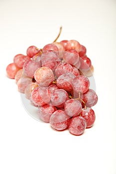 Red grapes on isolated white