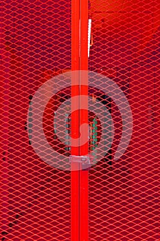 Red grating steel door with key