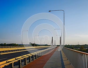 Red and gray pavement on huge Millennium bridge in Wroclaw