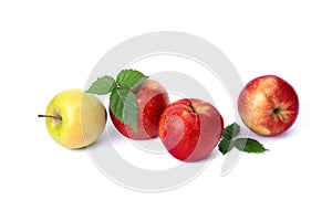Red and green apples on a white background. Green and red juicy apples with green leaves on an isolated background. A group of rip