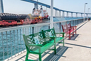 Red and Green Bench on Cesar Chavez Pier photo