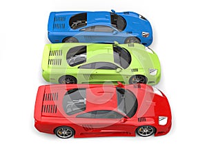 Red, green and blue concept super sports cars - side top view