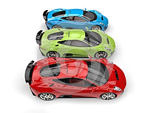 Red, green and blue elegant sports cars - top down side view