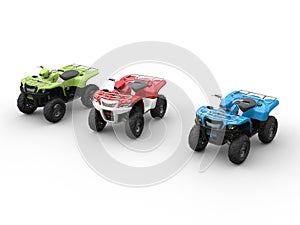 Red, green and blue four wheelers