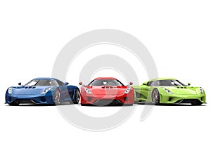 Red, green and blue supercars side by side photo