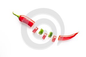 Red and green chili pepper sliced â€‹â€‹on white background. .Gastronomy and cooking condiments