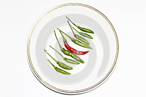 Red green chili peppers isolated on white background