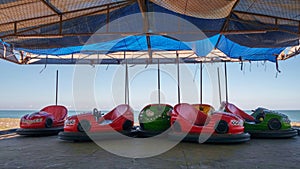 Red and green colored bumper cars