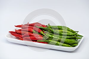 Red and green hot chili peppers isolated on white background.