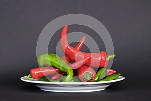 Hot stuff.Stack of red and green chilis