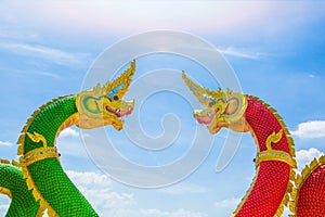 Red and green King of Nagas statue