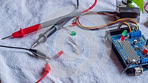 Red and green LED lights being shown in use as part of a microcontroller build