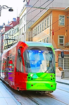 Red and green new tram on the street in Istanbul, Turkey