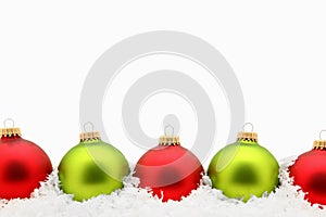 Red and Green Ornaments in Snow