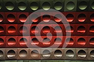 Red, green, silver wall in Prague metro station