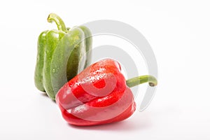 red and green sweet pepper isolated on white background