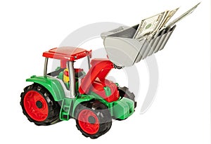 Red and green toy bulldozer with dollars