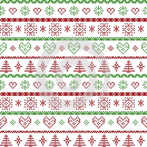 Red and green on the white background Nordic Christmas pattern with snowflakes and forest xmas trees decorative ornaments in