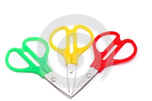 Red, green and yellow little scissors