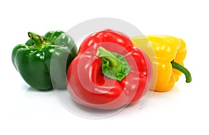 Red green and yellow pepper vegetables isolated