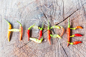 Red and greenchili pepper composed in the form of hope