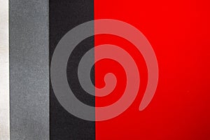 Red, grey, black and white papers background