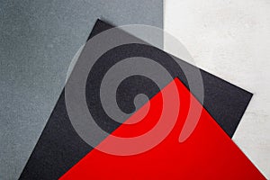 Red, grey, black and white papers background