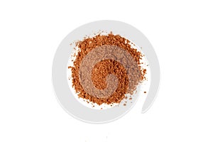 Red ground paprika isolated on white background, top view