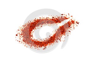 Red ground paprika isolated on white background, trail from a spoon