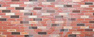 Red grunge brick wall texture background.
