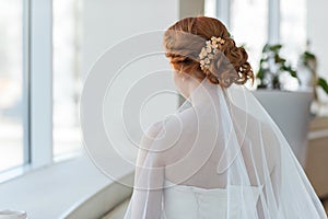 Red hair of the bride