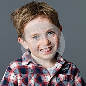 Red hair preschooler giggling for childhood and wellbeing