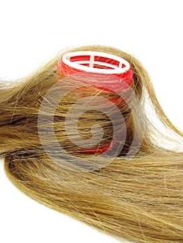 Red hair roller in hair wave