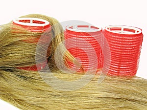 Red hair roller in hair wave