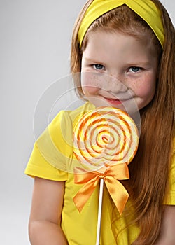 red-haired cutie in a yellow blouse and a headband, is touched and happy with her matchmaker - she was presented with a