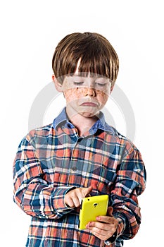 Red-haired funny boy with mobile phone