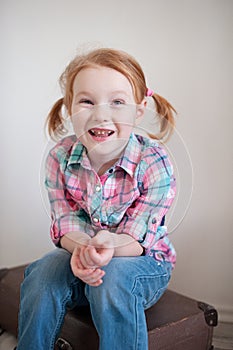 Red-haired girl with dental caries