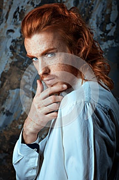 Red-haired metrosexual man. photo