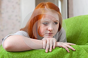 Red-haired unhappy teenager
