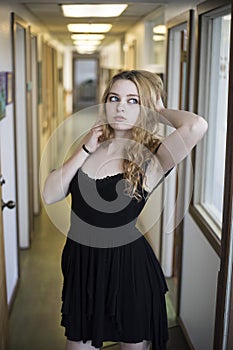 Red Haired Woman in Black Dress