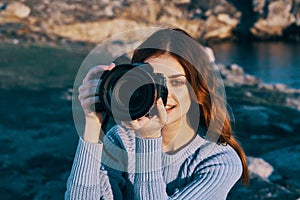 red-haired woman photographer nature rocky mountains professional