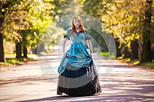 Red-haired woman in Victorian dress