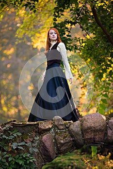 Red-haired woman in Victorian outfit