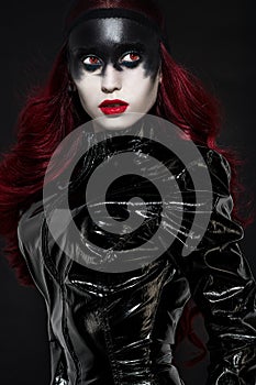 Red haired woman with weird black makeup