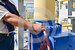 Red handle gate valve with steel pipe on gas compressor station