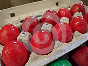 Red hard boiled Easter eggs for orthodox pascha ceremony