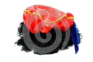 Red hat and black hair of Zwarte Piet