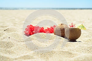 Red Hawaiian lei garland on the beach