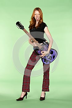 Red Head Rock and Roll Guitar Player with Tounge Stud