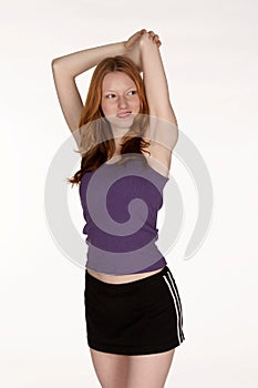 Red Head Woman Stretching Tricep